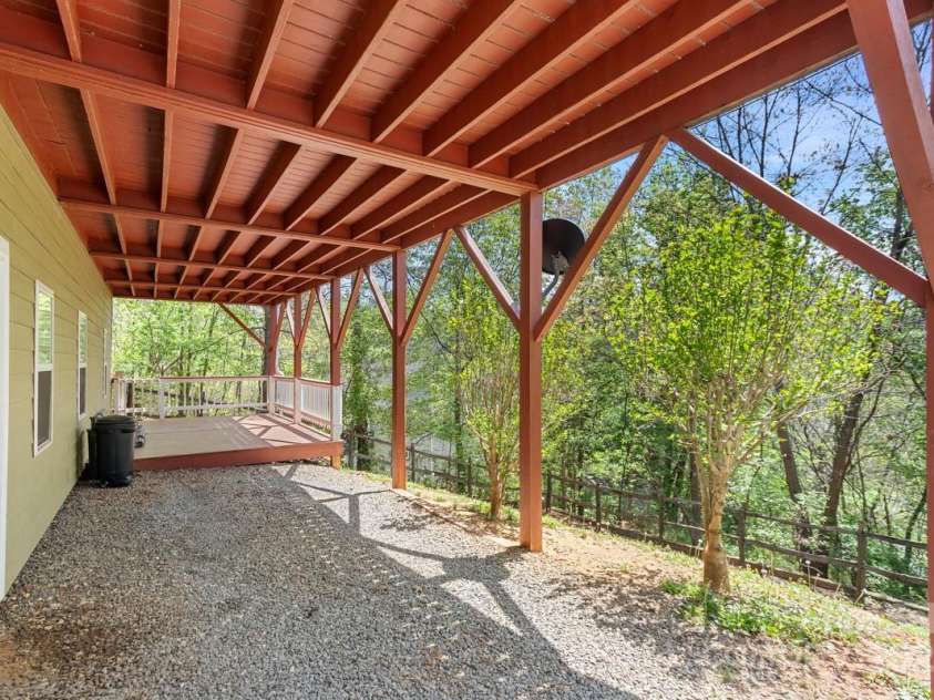 349 Penland Street, Clyde, NC 28721.  MLS# CAR4253328, YatesRealty ID 15558. Patio outside of walkout basement