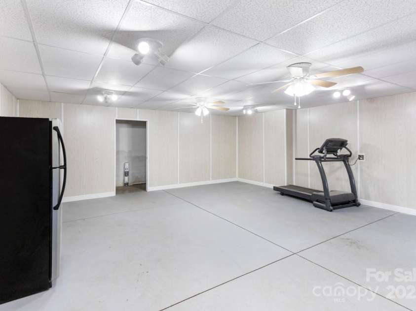 349 Penland Street, Clyde, NC 28721.  MLS# CAR4253328, YatesRealty ID 15558. Very usable basement area