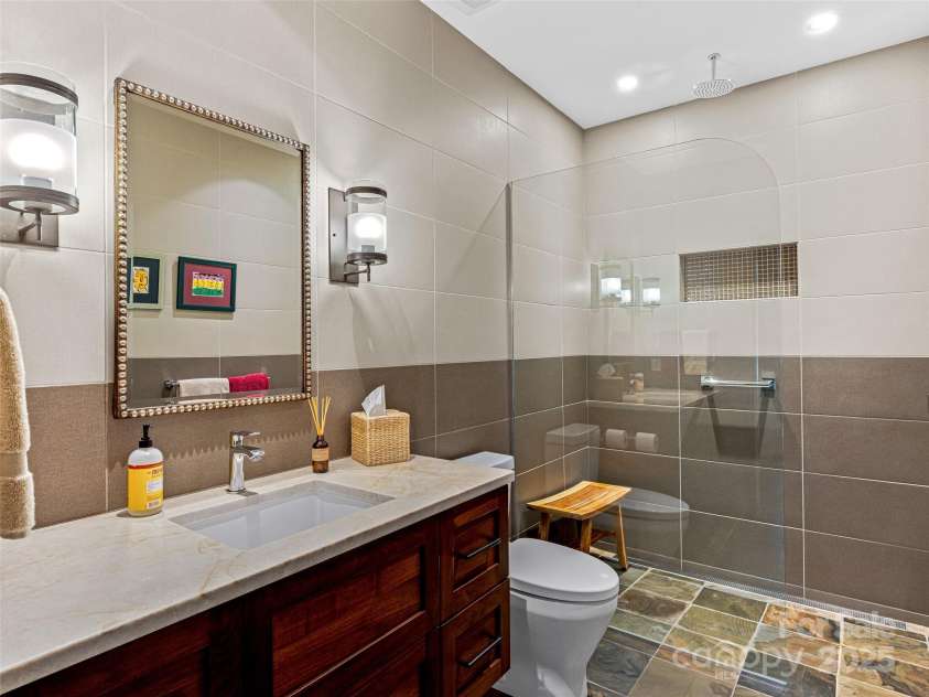 3 Bayonne Trail, Asheville, NC 28804.  MLS# CAR4262687, YatesRealty ID 1556. Terrace level guest bath