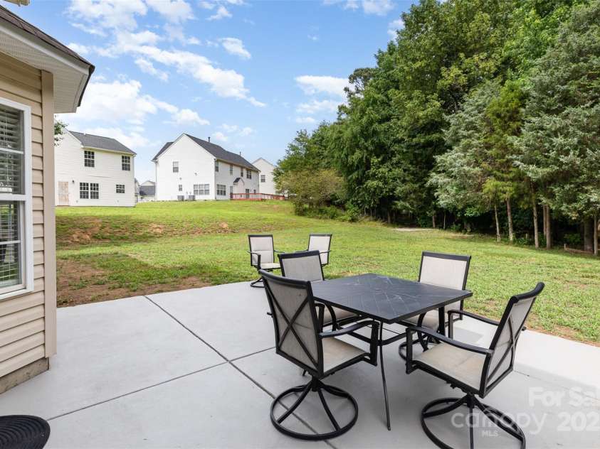 6608 Pattonsburg Drive, Charlotte, NC 28213.  MLS# CAR4260282, YatesRealty ID 15561. Back patio