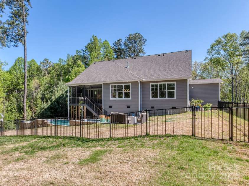 143 Robinson Ridge Drive, Mooresville, NC 28117.  MLS# CAR4246025, YatesRealty ID 15567. Fenced Backyard (the backyard extends significantly past the fence line)