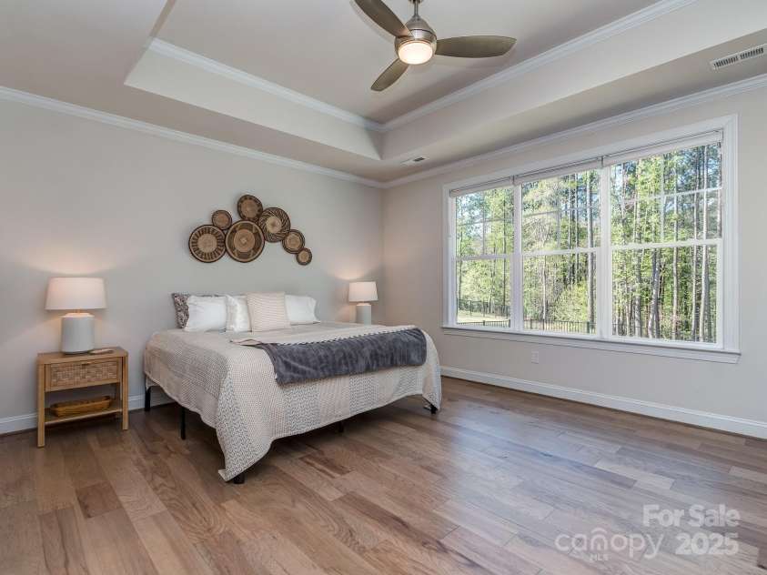 143 Robinson Ridge Drive, Mooresville, NC 28117.  MLS# CAR4246025, YatesRealty ID 15567. Main Floor Primary Bedroom