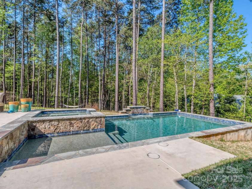 143 Robinson Ridge Drive, Mooresville, NC 28117.  MLS# CAR4246025, YatesRealty ID 15567. Pool with Sun Deck
