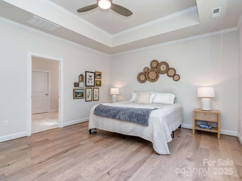143 Robinson Ridge Drive, Mooresville, NC 28117.  MLS# CAR4246025, YatesRealty ID 15567. Primary Bedroom w/ Tray Ceiling