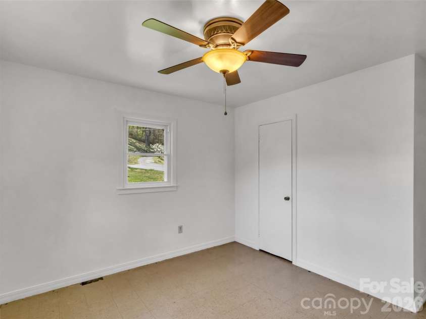 61 Indian Trail Loop, Waynesville, NC 28786.  MLS# CAR4368770, YatesRealty ID 15569. Bedroom 1