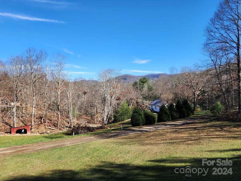 20 Coventry Lane, Burnsville, NC 28714.  MLS# CAR4199768, YatesRealty ID 1557. View from deck at front of home