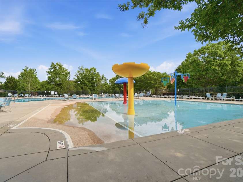 10469 Scotland Avenue, Fort Mill, SC 29707.  MLS# CAR4369452, YatesRealty ID 15570. Splash Pad for kiddos!