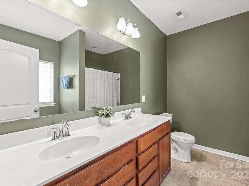306 Fesperman Circle, Troutman, NC 28166.  MLS# CAR4250559, YatesRealty ID 15570. Ensuite bathroom