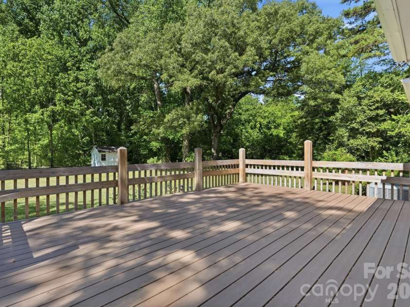 9021 Oxford Place, Huntersville, NC 28078.  MLS# CAR4372288, YatesRealty ID 15571. Large deck with composite decking boards means less maintenance.