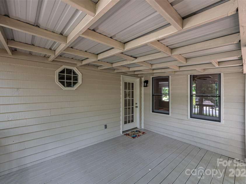 5138 Foley Drive, Hickory, NC 28601.  MLS# CAR4217198, YatesRealty ID 15572. Covered Back Porch.