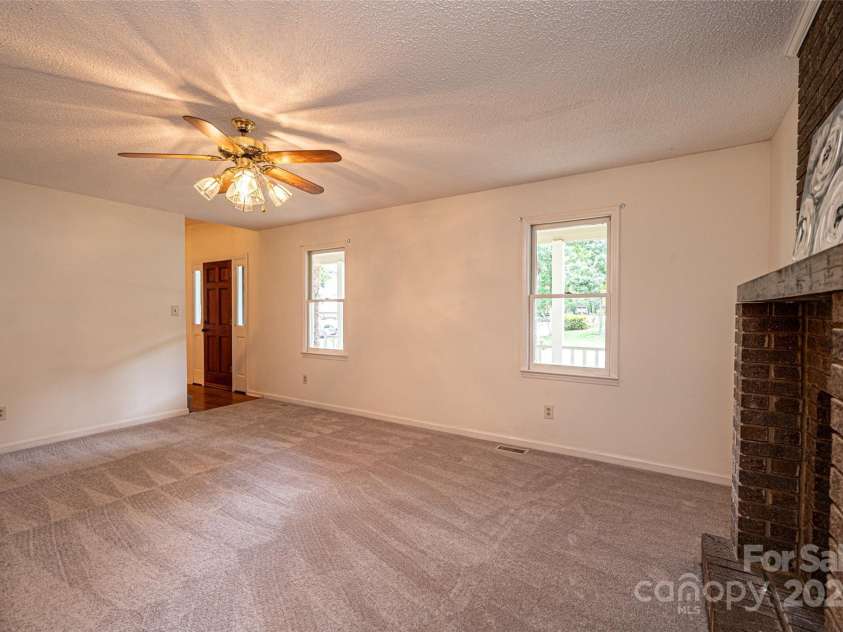 5138 Foley Drive, Hickory, NC 28601.  MLS# CAR4217198, YatesRealty ID 15572. Living Room View from formal dining room.