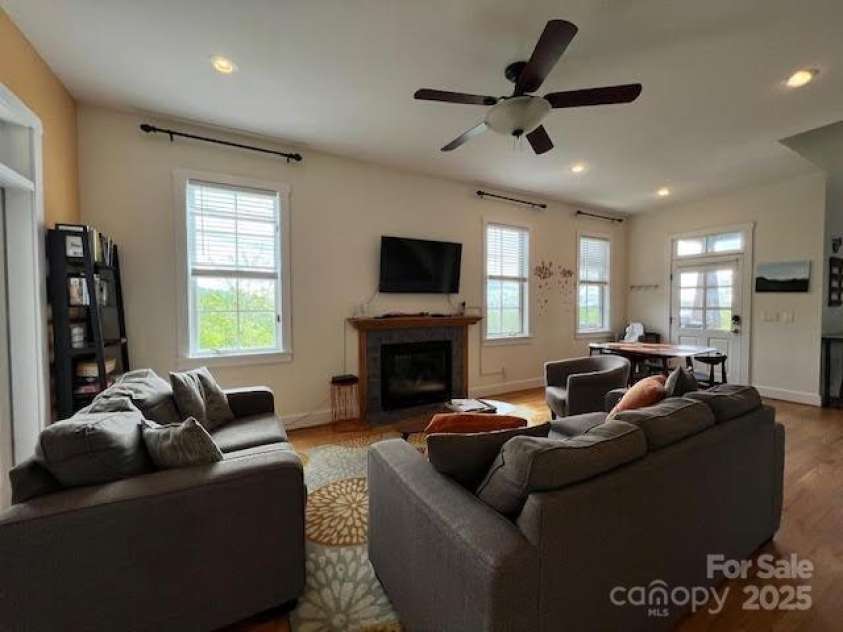 115 Breakaway Trail, Mars Hill, NC 28754.  MLS# CAR4257257, YatesRealty ID 15574. LIVING ROOM WITH GAS-LOG FIREPLACE