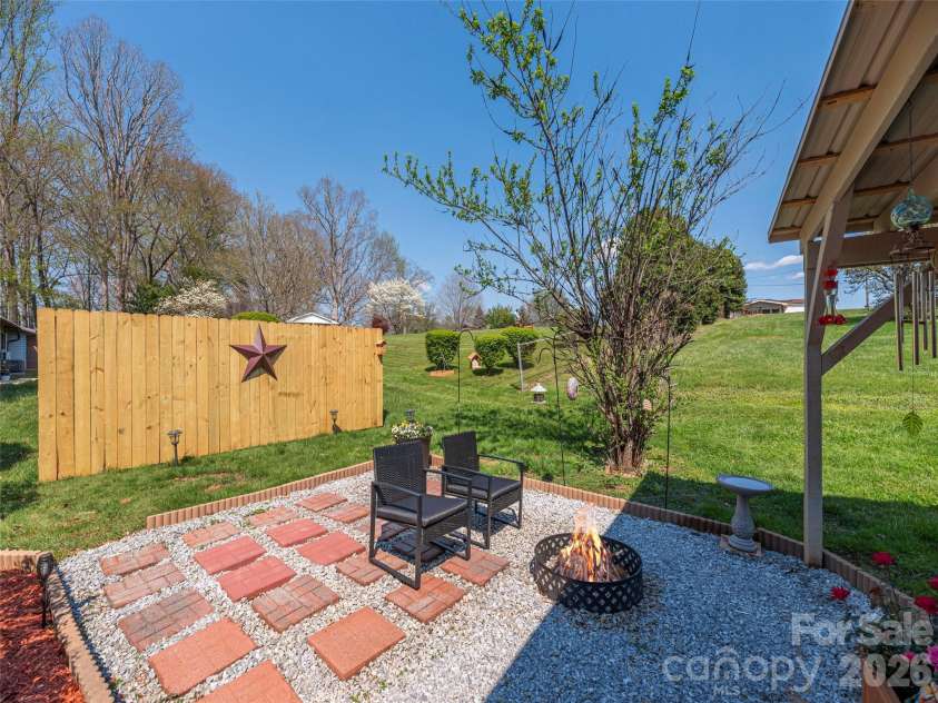 86 Hideaway Lane, Waynesville, NC 28785.  MLS# CAR4371205, YatesRealty ID 15574. Back Patio