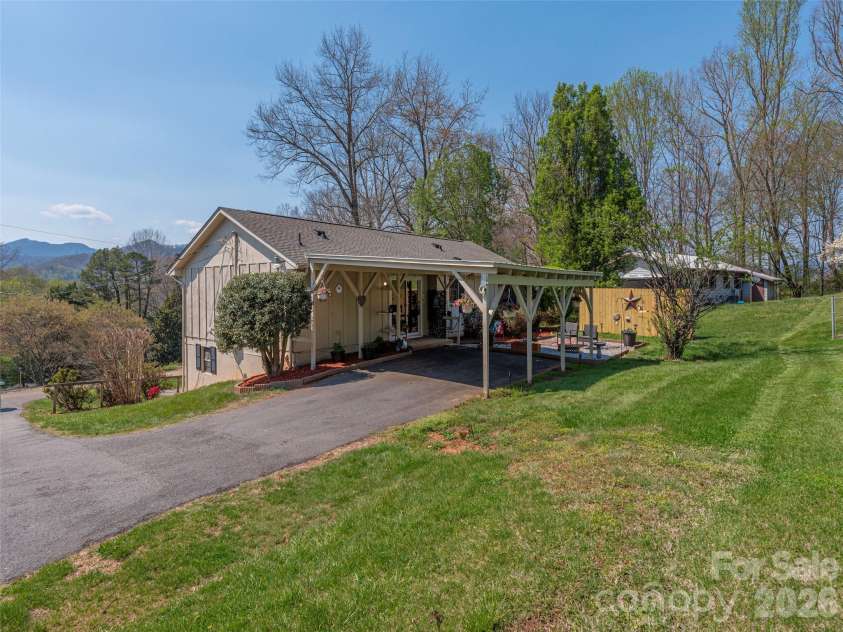 86 Hideaway Lane, Waynesville, NC 28785.  MLS# CAR4371205, YatesRealty ID 15574. Off Frame Modular with Carport Back View