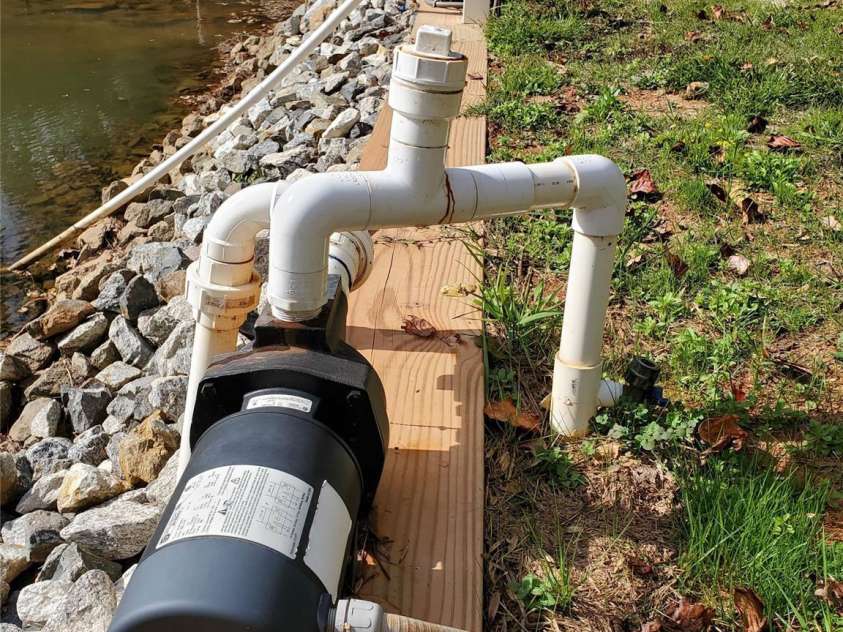 8384 Blades Trail, Denver, NC 28037.  MLS# CAR4221160, YatesRealty ID 15575. Irrigation pump