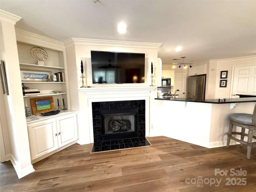 930 Jetton Street, Davidson, NC 28036.  MLS# CAR4309851, YatesRealty ID 15576. Gas fireplace and custom built cabinets