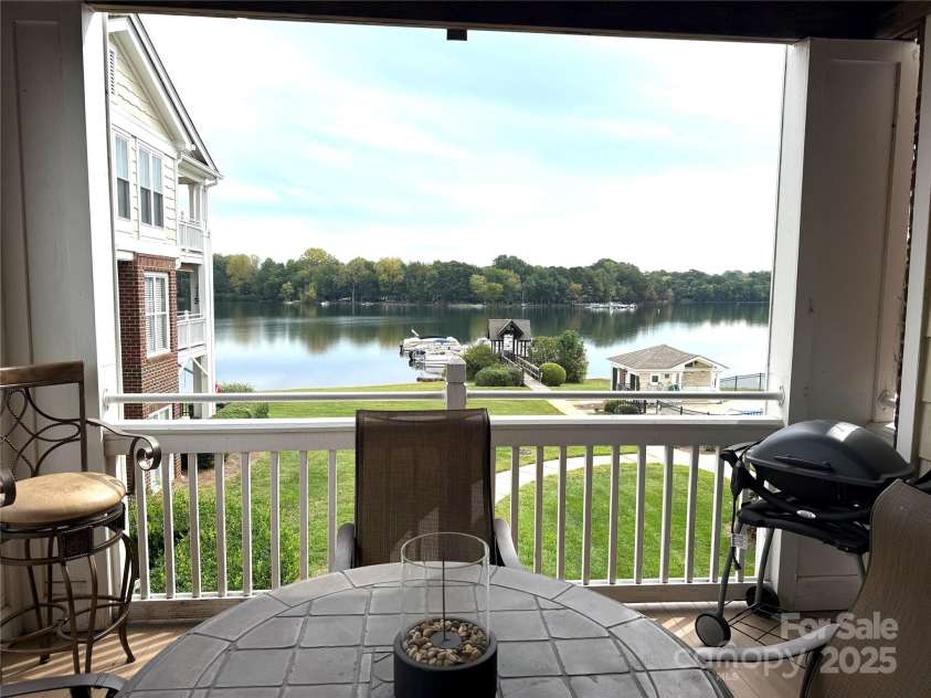 930 Jetton Street, Davidson, NC 28036.  MLS# CAR4309851, YatesRealty ID 15576. Incredible views from living area, primary bedroom and kitchen!!  Boat slip included!! Elevator in building!!
