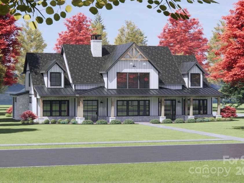 Lot 2 Country Estates Drive, Waxhaw, NC 28173.  MLS# CAR4276573, YatesRealty ID 1559. This proposed home is clad in white board-and-batten siding, accented with stonework at the base of the columns and foundation for added texture and elegance.