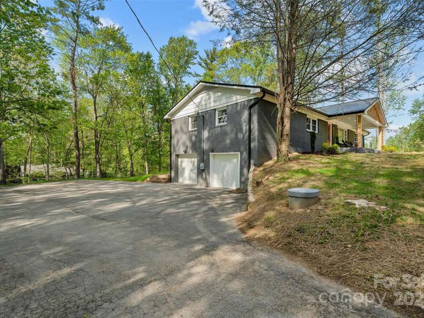 75 White Pine Drive, Fletcher, NC 28732.  MLS# CAR4251486, YatesRealty ID 15590. Driveway & Garage