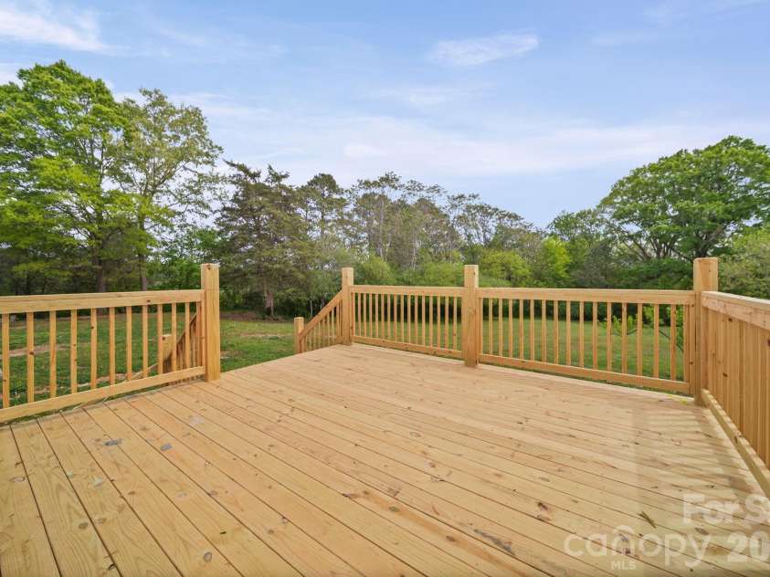 8592 Amanda Lane, Norwood, NC 28128.  MLS# CAR4368057, YatesRealty ID 15590. Back deck