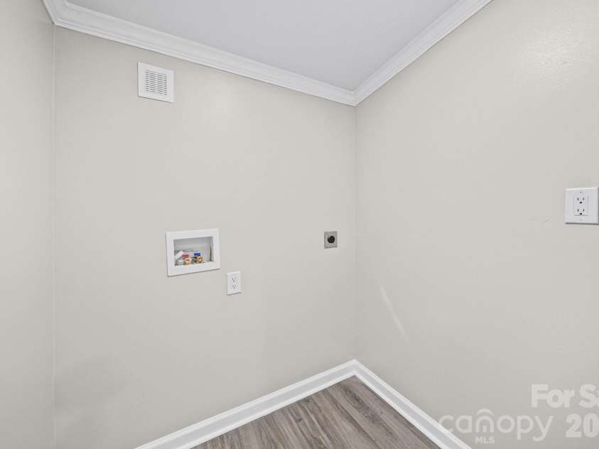 8592 Amanda Lane, Norwood, NC 28128.  MLS# CAR4368057, YatesRealty ID 15590. Laundry room