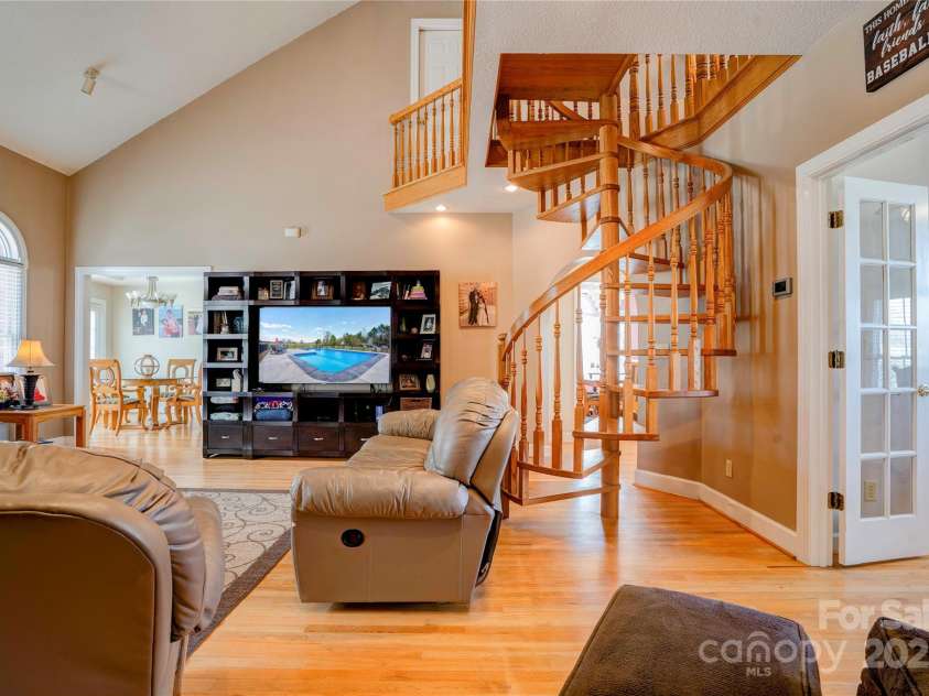 1026 Stage Coach Trail, Lawndale, NC 28090.  MLS# CAR4239349, YatesRealty ID 15597. Living Room - stairs to bonus room 2