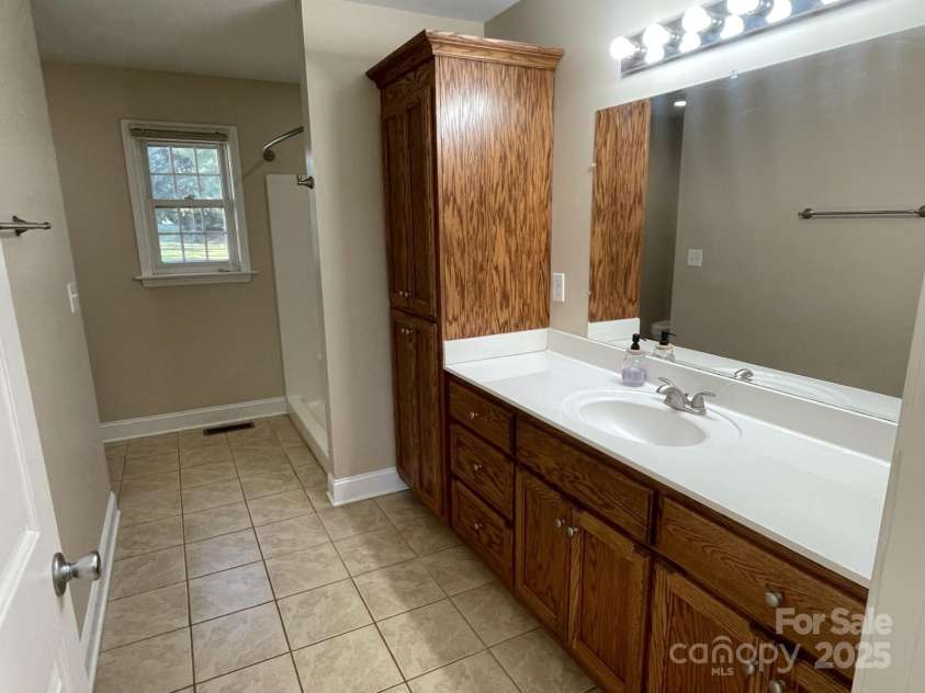 232 Gold Street, New London, NC 28127.  MLS# CAR4309607, YatesRealty ID 156. Primary bathroom
