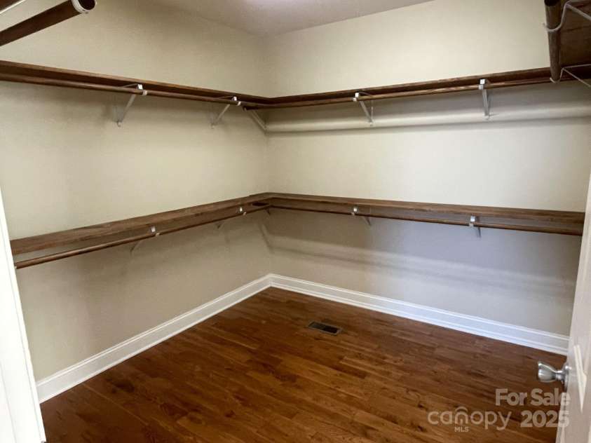 232 Gold Street, New London, NC 28127.  MLS# CAR4309607, YatesRealty ID 156. Walk in closet in primary bedroom