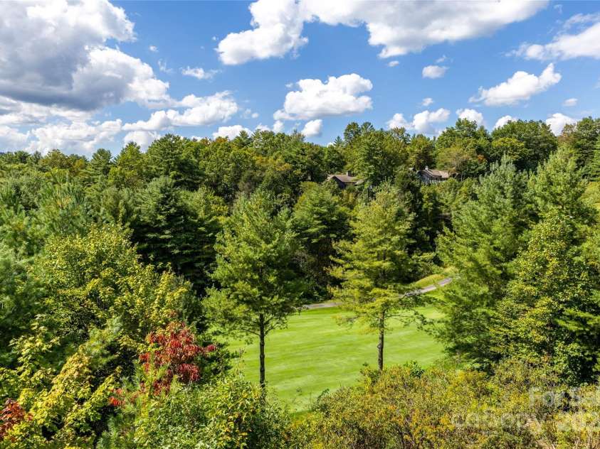 86 Racquet Club Villas Drive, Sapphire, NC 28774.  MLS# CAR4185779, YatesRealty ID 1560. 