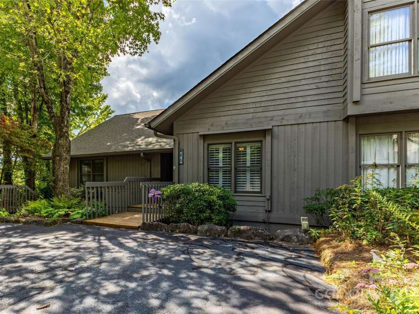 86 Racquet Club Villas Drive, Sapphire, NC 28774.  MLS# CAR4185779, YatesRealty ID 1560. 