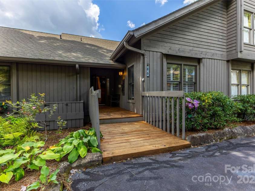 86 Racquet Club Villas Drive, Sapphire, NC 28774.  MLS# CAR4185779, YatesRealty ID 1560. 