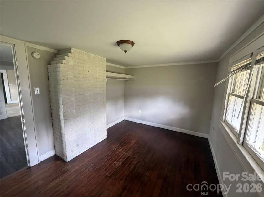 1002 Salisbury Avenue, Spencer, NC 28159.  MLS# CAR4365661, YatesRealty ID 15605. Front secondary bedroom