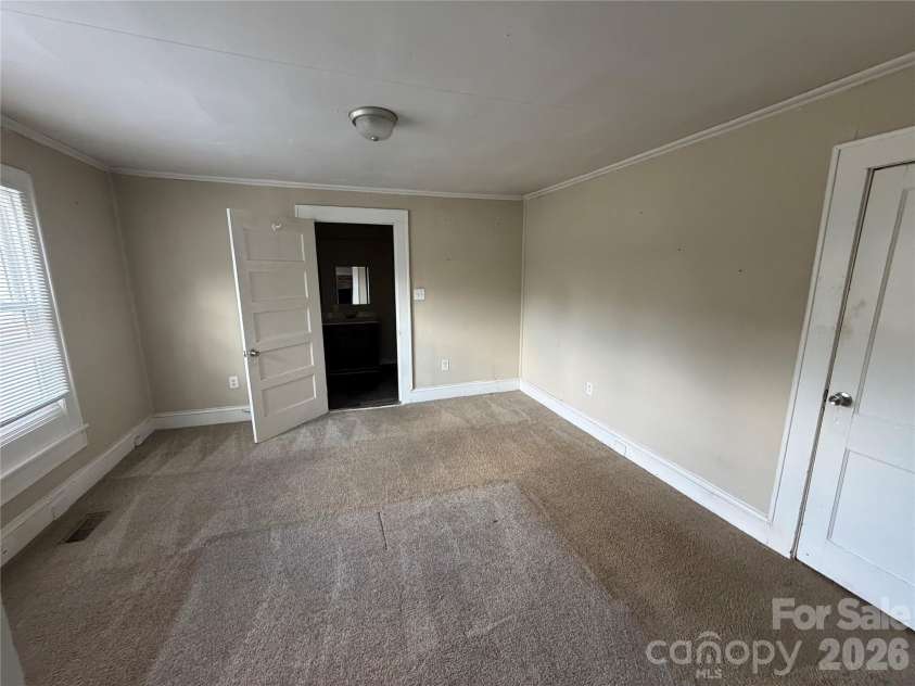 1002 Salisbury Avenue, Spencer, NC 28159.  MLS# CAR4365661, YatesRealty ID 15605. Primary bedroom