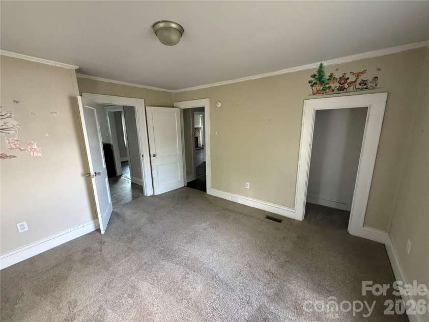 1002 Salisbury Avenue, Spencer, NC 28159.  MLS# CAR4365661, YatesRealty ID 15605. Rear secondary bedroom