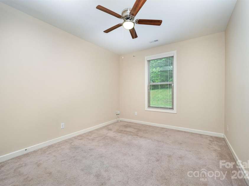 8268 Breton Way, Harrisburg, NC 28075.  MLS# CAR4255041, YatesRealty ID 15606. Downstairs full Bedroom 4