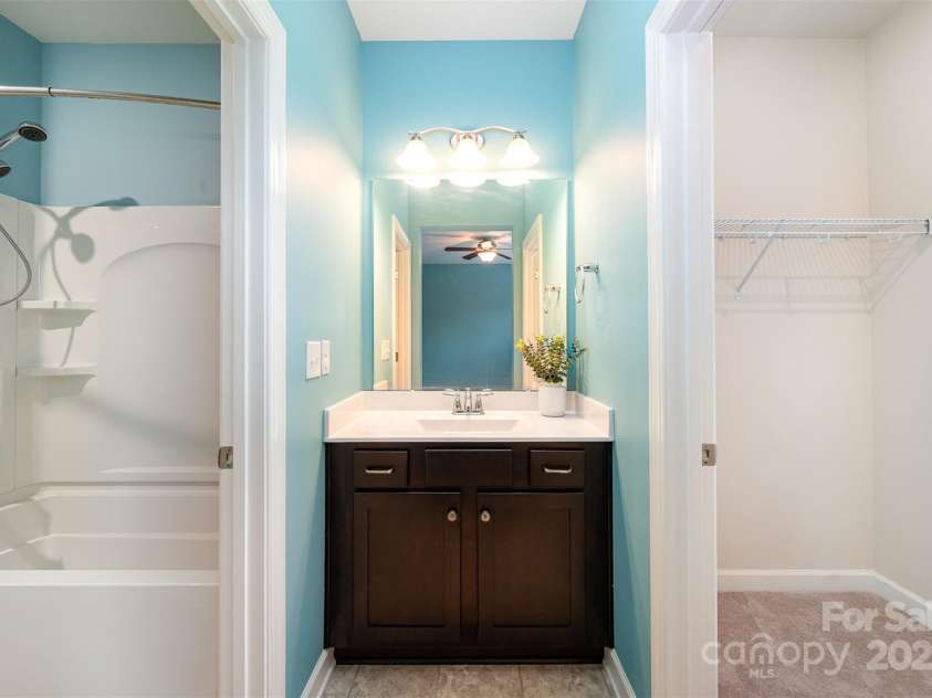 8268 Breton Way, Harrisburg, NC 28075.  MLS# CAR4255041, YatesRealty ID 15606. Walk in closet, separate sink area.