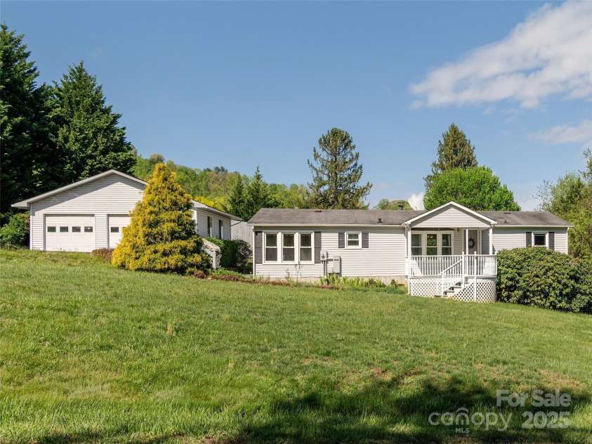 34 Eve Drive, Asheville, NC 28806.  MLS# CAR4251333, YatesRealty ID 15612. Convenient location with lots of space inside and outside