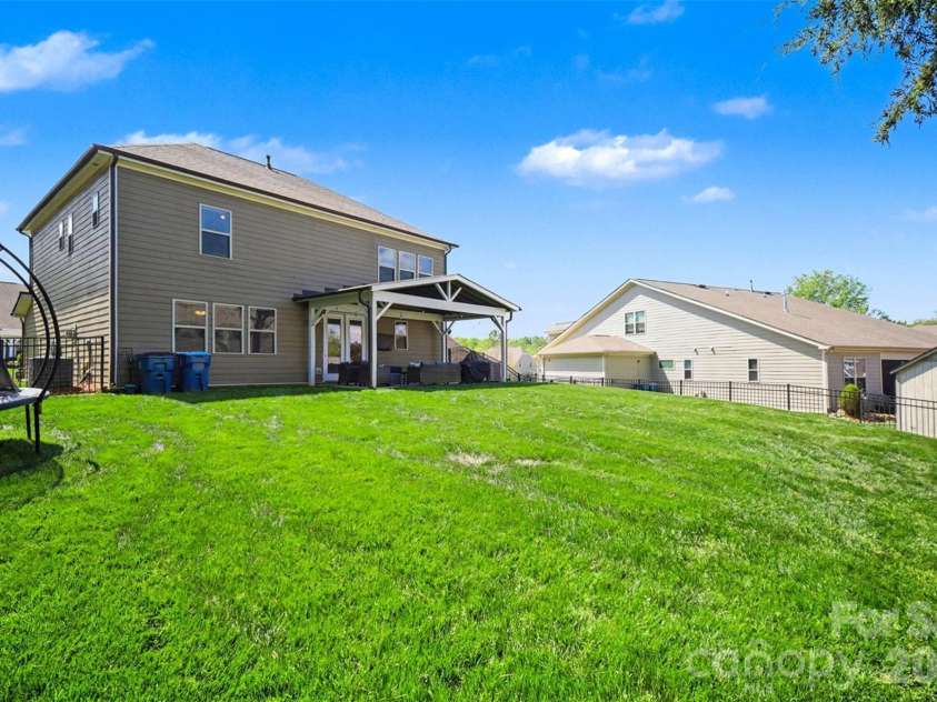514 Tack Lane, Midland, NC 28107.  MLS# CAR4358317, YatesRealty ID 15618. Beautiful, large backyard.