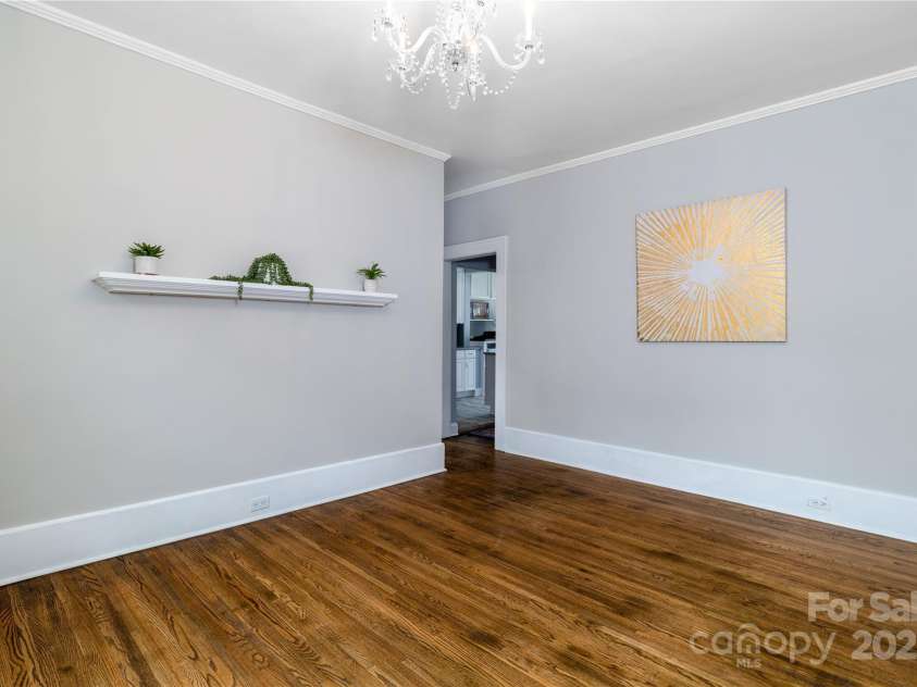 524 Hawthorne Lane, Charlotte, NC 28204.  MLS# CAR4263510, YatesRealty ID 15618. Entry from front door into living area