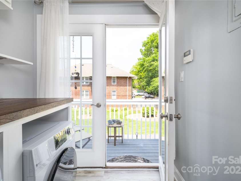 524 Hawthorne Lane, Charlotte, NC 28204.  MLS# CAR4263510, YatesRealty ID 15618. Laundry and deck