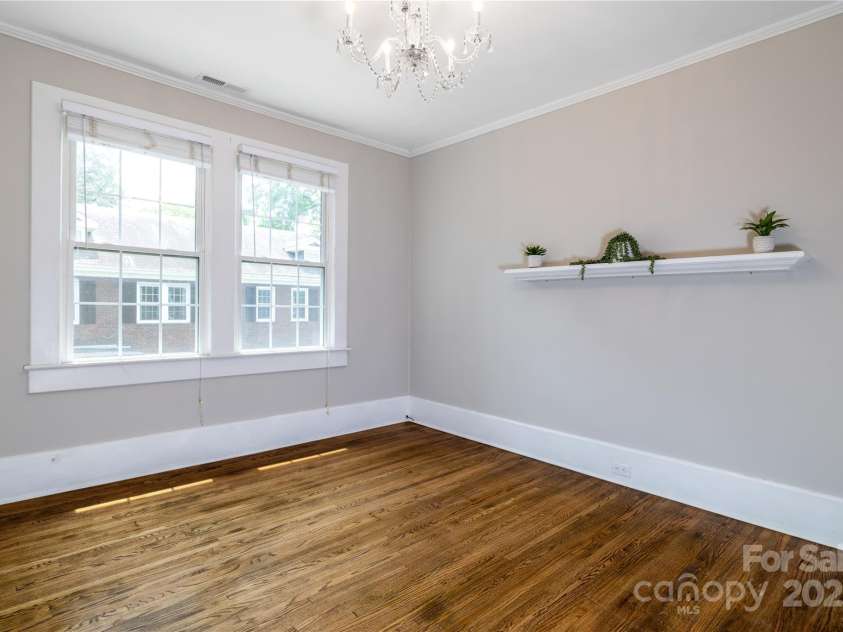 524 Hawthorne Lane, Charlotte, NC 28204.  MLS# CAR4263510, YatesRealty ID 15618. Opposite side of living room