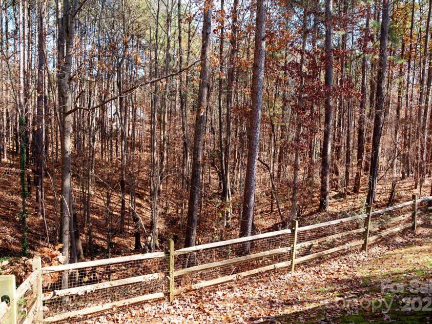 214 Harbor Landing Drive, Mooresville, NC 28117.  MLS# CAR4326069, YatesRealty ID 15621. Side of House