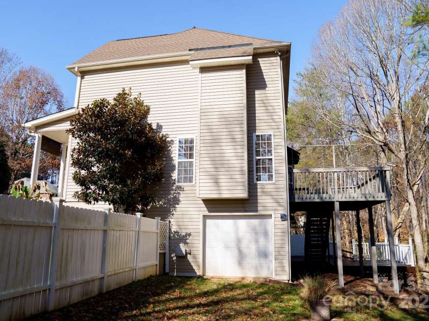 214 Harbor Landing Drive, Mooresville, NC 28117.  MLS# CAR4326069, YatesRealty ID 15621. Side of House