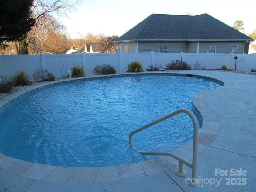 1601 Eden Glen Drive, Dallas, NC 28034.  MLS# CAR4211731, YatesRealty ID 15625. Inground salt water pool