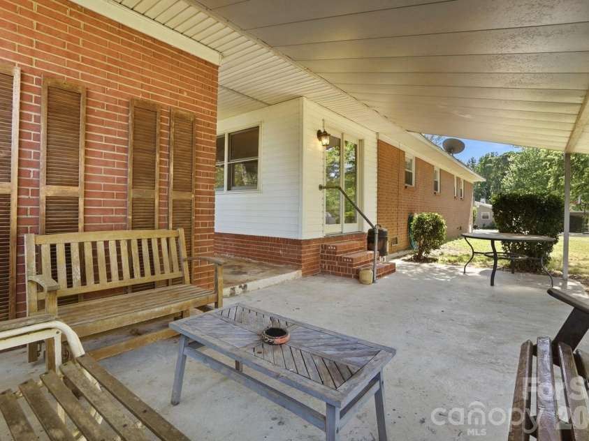 2531 Arnold Drive, Monroe, NC 28110.  MLS# CAR4369421, YatesRealty ID 15626. Covered Back Patio