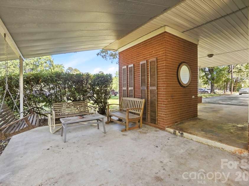 2531 Arnold Drive, Monroe, NC 28110.  MLS# CAR4369421, YatesRealty ID 15626. Covered Back Patio
