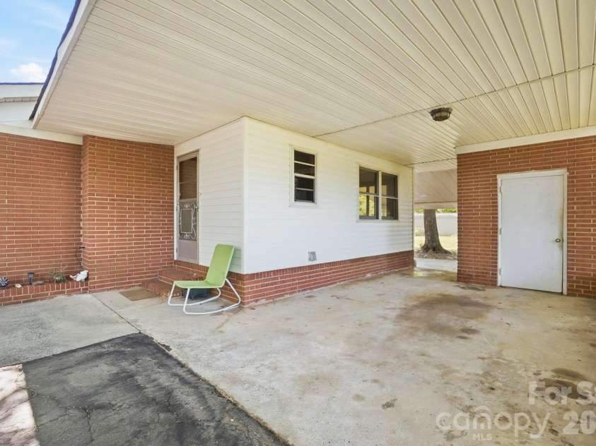 2531 Arnold Drive, Monroe, NC 28110.  MLS# CAR4369421, YatesRealty ID 15626. Large Carport