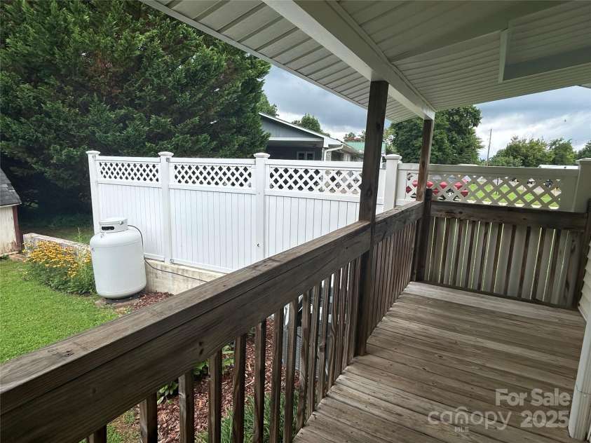 617 Reservoir Road, Marion, NC 28752.  MLS# CAR4257256, YatesRealty ID 15627. Back Porch just outside the office