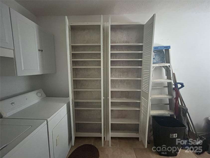 617 Reservoir Road, Marion, NC 28752.  MLS# CAR4257256, YatesRealty ID 15627. Shelves in Laundry