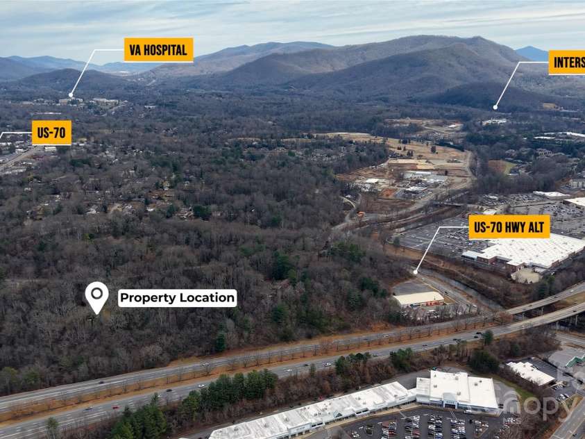 67 Shawnee Trail, Asheville, NC 28805.  MLS# CAR4331437, YatesRealty ID 1563. 8.87 acres w Cabin, near I-40,I-240, Tunnel Road,Mall,VA Hospital, Downtown Asheville